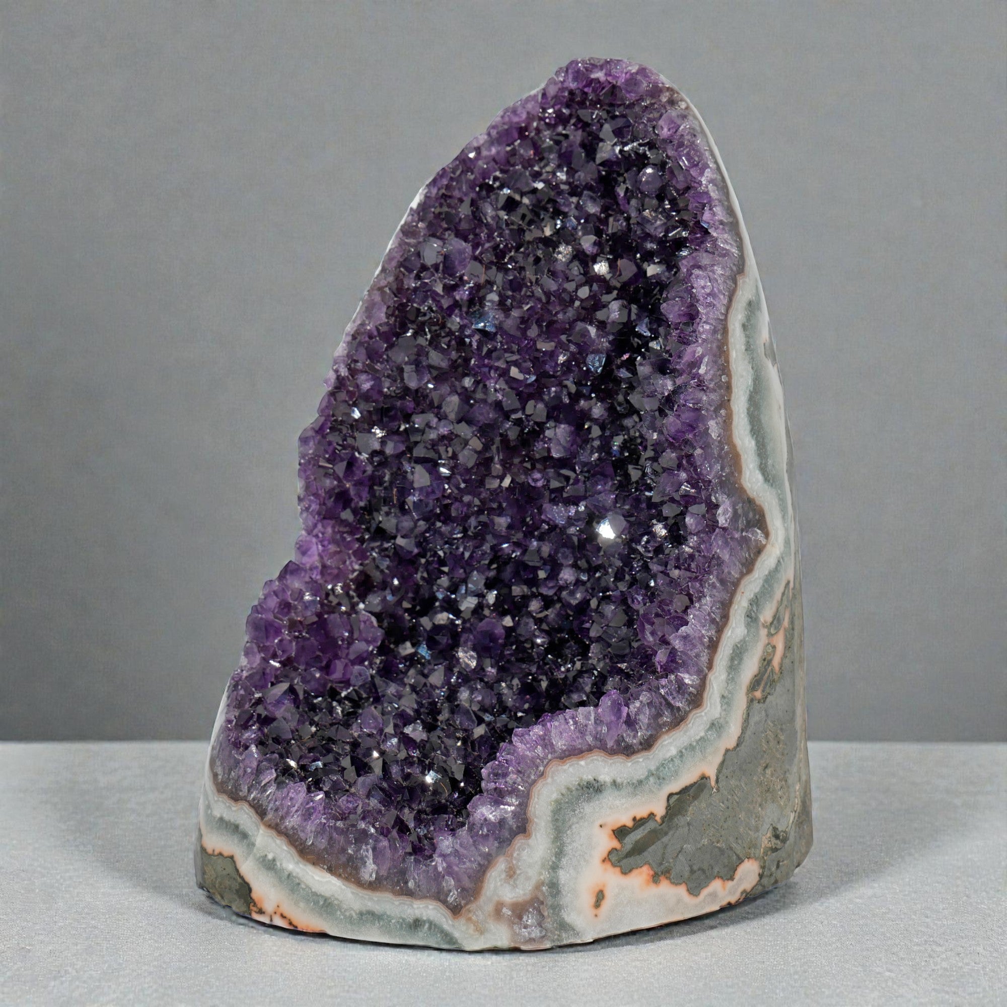 Category image for extra-large amethyst clusters, showcasing statement purple crystal geodes with high-saturation druzy formations and sculptural mineral structures.