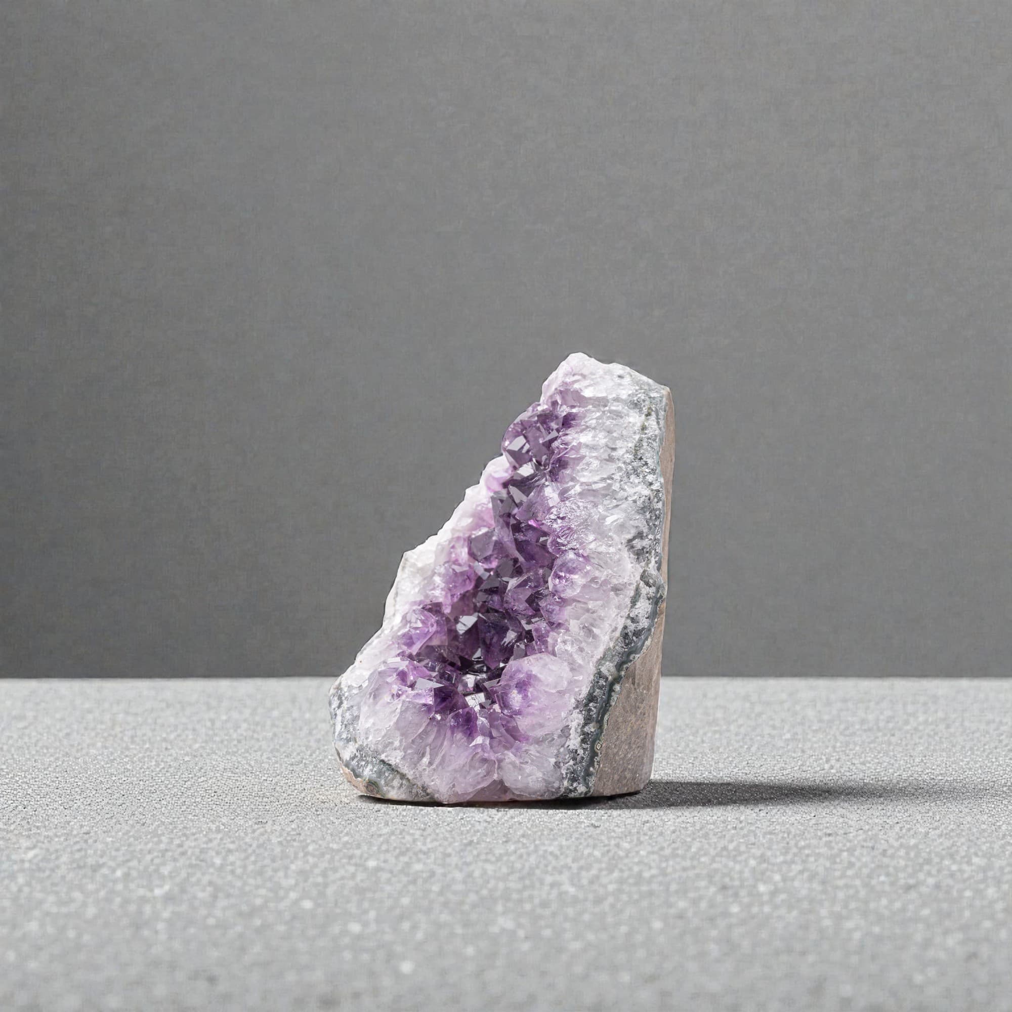 ethically sourced amethyst under 1 lb. Self stand, cut based purple quartz.