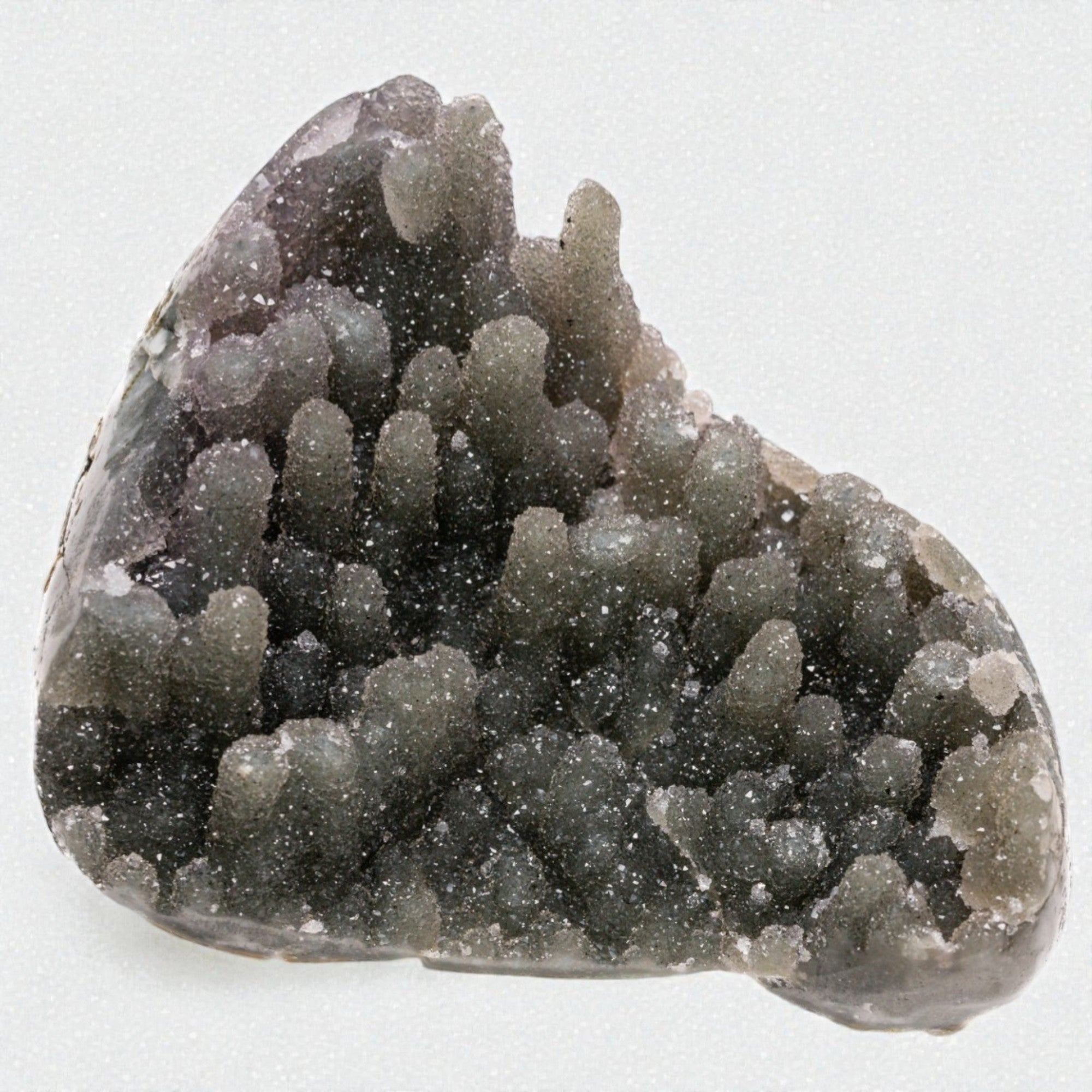 hand sized heode with grey sugar amethyst crystals