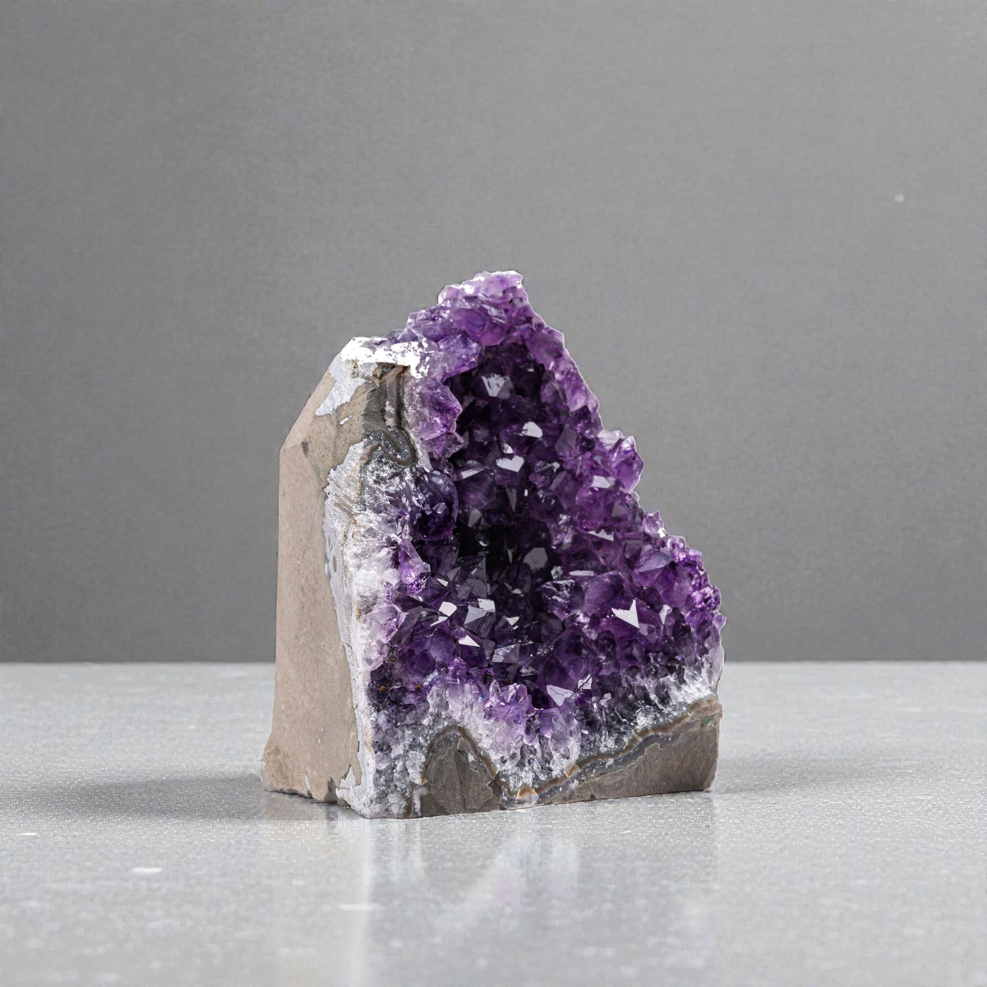 Artigas mines carries the glow of natural crystals from Urugua. Deep Purple amethyst cluster.