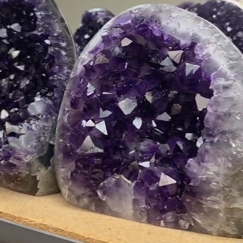 This premium AAA grade Uruguayan amethyst cluster (4-5 lb) carries the glow of natural crystals from Uruguay with exceptional color depth and clarity. Perfect for those looking to buy rare quality amethyst for luxury home decor or serious crystal collections, this museum-grade piece adds elegance and grounding calm to any space